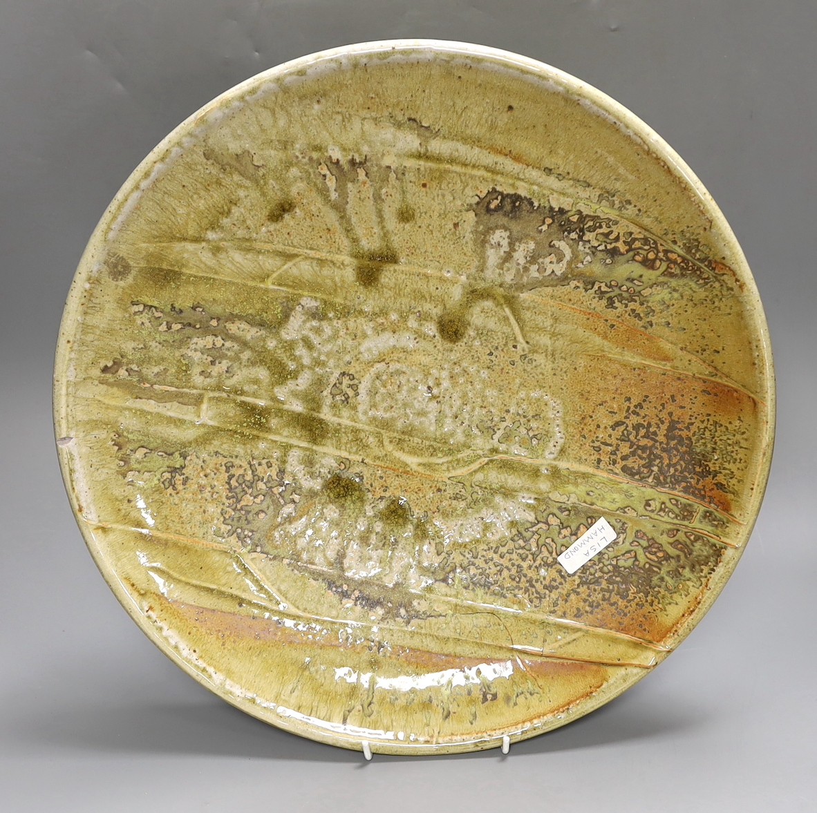 A Lisa Hammond studio pottery charger, 42cm diameter